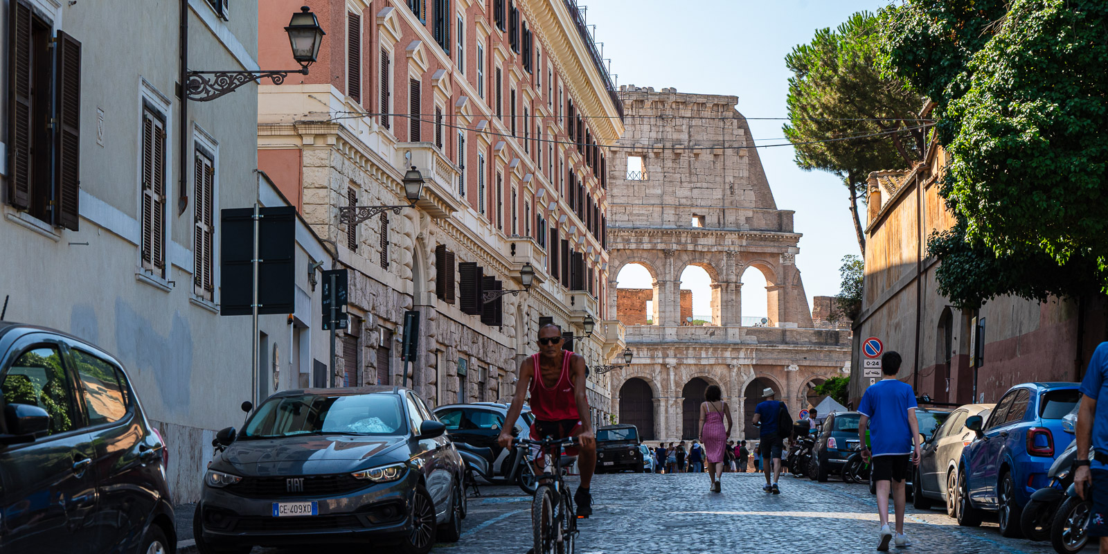 Elevated view of the Colosseum from Via del Colosseo